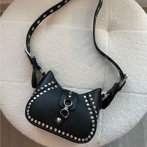 Studded black shoulder bag